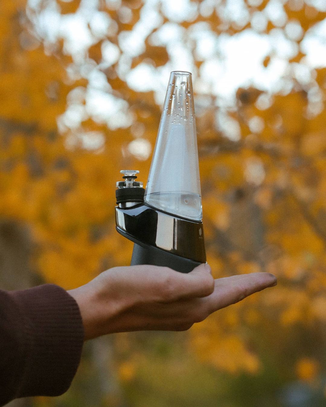 puffco peak vaporizer smart dab rig lifestyle hand